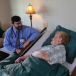 Doctor discussing care options with a patient, highlighting the differences between hospice and palliative care