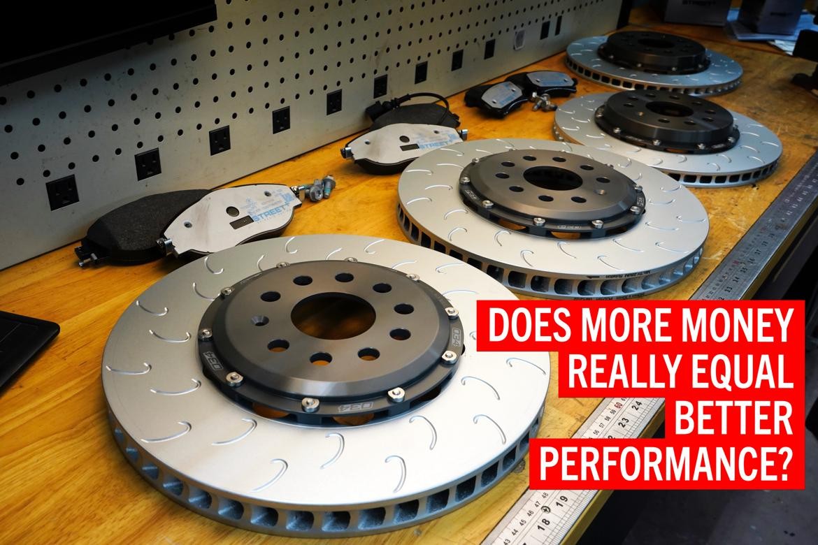 Upgraded two-piece car rotors installed on a Volkswagen GTI project car, enhancing braking performance.